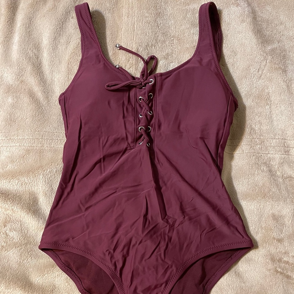 burgundy lace up swimsuit with low cut back